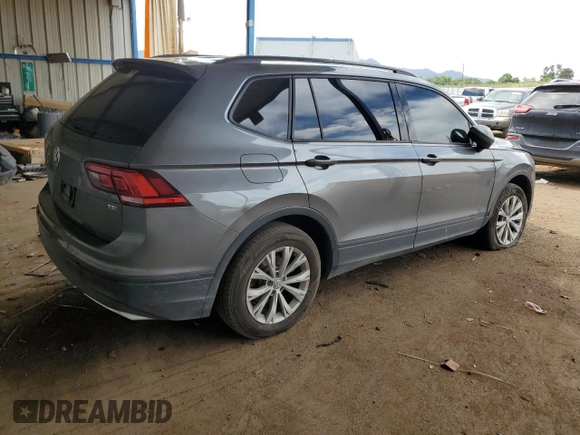 2018 Volkswagen Tiguan S with VIN 3VV1B7AXXJM054778, listed as a Copart auction lot 61294795 with 87,330 mi miles and Salvage title. Bid and sale history available at DreamBid. Image 3.