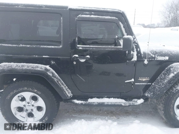 2014 Jeep Wrangler Sahara with VIN 1C4AJWBG3EL190302, listed as a IAAI auction lot 41299284 with 112,476 mi miles and . Bid and sale history available at DreamBid. Image 14.