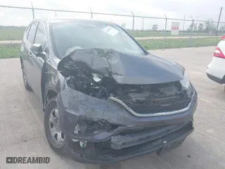 2015 Honda CR-V LX with VIN 3CZRM3H39FG713750, listed as a IAAI auction lot 41938871 with 53,141 mi miles. Bid and sale history available at carsss.com. Image 6.
