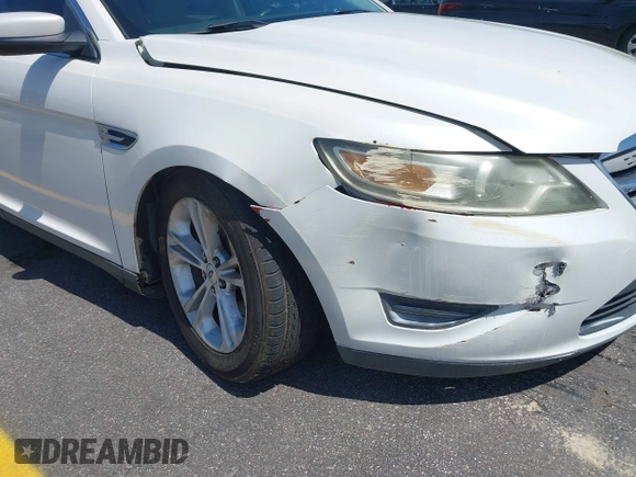 2014 Ford Taurus SEL with VIN 1FAHP2E86EG132676, listed as a IAAI auction lot 41943392 with 183,633 mi miles. Bid and sale history available at carsss.com. Image 13.