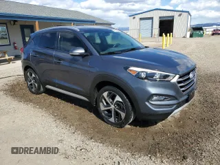 2017 Hyundai Tucson Sport with VIN KM8J3CA20HU395455, listed as a Copart auction lot 52030775 with 104,655 mi miles and Clean Title. Bid and sale history available at DreamBid. Image 4.