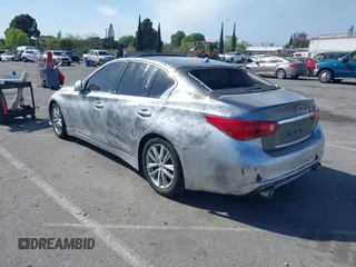 2015 Infiniti Q50 z VIN JN1BV7AP0FM332023, wystawiony jako IAAI lot #41960006 z przebiegiem 173 540 mil mil oraz . Historia ofert i sprzedaży dostępna na DreamBid. Obrazek 3.
