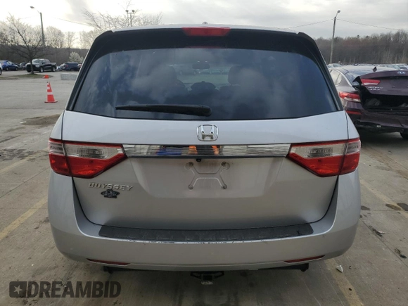 2012 Honda Odyssey EX-L with VIN 5FNRL5H60CB117376, listed as a Copart auction lot 50740725 with 163,716 mi miles and Salvage Title. Bid and sale history available at DreamBid. Image 6.