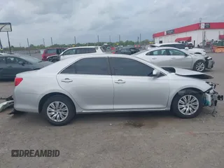 2014 Toyota Camry L with VIN 4T1BF1FK6EU346670, listed as a IAAI auction lot 41942544 with 140,438 mi miles and . Bid and sale history available at DreamBid. Image 14.