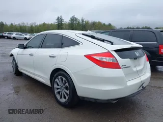 2010 Honda Crosstour EX-L z VIN 5J6TF2H55AL010444, wystawiony jako IAAI lot #42187788 z przebiegiem 217 940 mil mil oraz . Historia ofert i sprzedaży dostępna na DreamBid. Obrazek 3.
