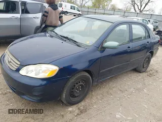2004 Toyota Corolla CE with VIN 2T1BR32E44C261569, listed as a IAAI auction lot 42013805 with 299,999 mi miles and . Bid and sale history available at DreamBid. Image 2.