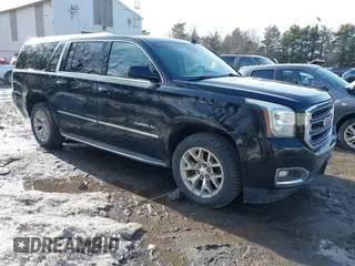 2015 GMC Yukon XL SLT with VIN 1GKS2HKC9FR159164, listed as a IAAI auction lot 41708822 with 136,730 mi miles. Bid and sale history available at carsss.com. Image 1.