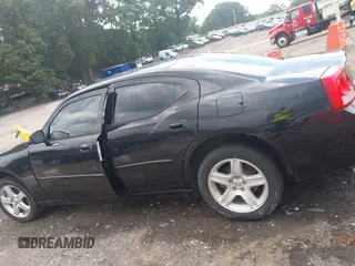 2010 Dodge Charger with VIN 2B3CK4CV0AH238001, listed as a IAAI auction lot 42449286 with 245,934 mi miles and . Bid and sale history available at DreamBid. Image 15.