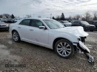 2015 Chrysler 300 C with VIN 2C3CCAET3FH922283, listed as a Copart auction lot 43240615 with 46,329 mi miles and Salvage Title. Bid and sale history available at DreamBid. Image 4.