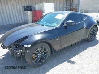 2019 Nissan 370Z Sport Touring with VIN JN1AZ4EH1KM420719, listed as a IAAI auction lot 42096816 with 97,803 mi miles and . Bid and sale history available at DreamBid. Image 2.
