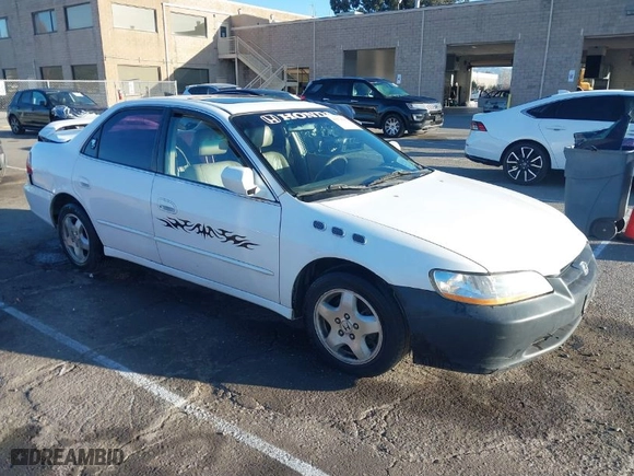 1999 Honda Accord Sdn EX with VIN 1HGCG1659XA049897, listed as a IAAI auction lot 41674942 with 194878 miles. Bid and sale history available at carsss.com. Image 1.