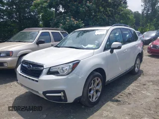 2017 Subaru Forester Touring z VIN JF2SJAWC1HH463163, wystawiony jako IAAI lot #42480107 z przebiegiem 70 337 mil mil oraz . Historia ofert i sprzedaży dostępna na DreamBid. Obrazek 17.