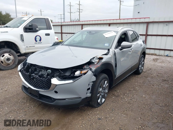 2025 Mazda CX-30 S Preferred with VIN 3MVDMBCM7SM771411, listed as a IAAI auction lot 41290560 with 4 mi miles and . Bid and sale history available at DreamBid. Image 2.