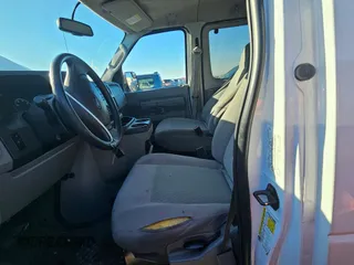 2013 Ford Econoline Passenger XL with VIN 1FBSS3BL8DDA56153, listed as a Copart auction lot 79716234 with Not Provided miles and Salvage Title. Bid and sale history available at DreamBid. Image 7.