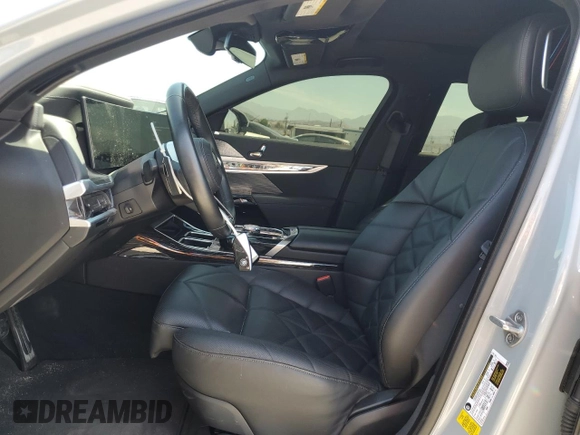 2023 BMW 7 Series 740i with VIN WBA23EH05PCM61539, listed as a Copart auction lot 58013225 with 16,242 mi miles and Salvage title. Bid and sale history available at DreamBid. Image 7.