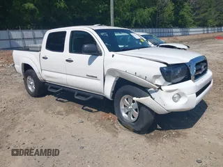 2005 Toyota Tacoma with VIN 3TMLU42NX5M001744, listed as a IAAI auction lot 42130285 with 148,968 mi miles and . Bid and sale history available at DreamBid. Image 1.