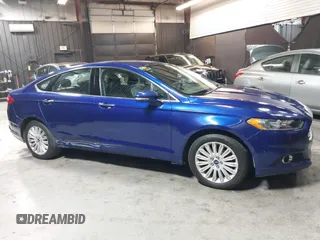 2016 Ford Fusion SE Hybrid with VIN 3FA6P0LU0GR242288, listed as a IAAI auction lot 41867085 with 114,063 mi miles. Bid and sale history available at carsss.com. Image 13.