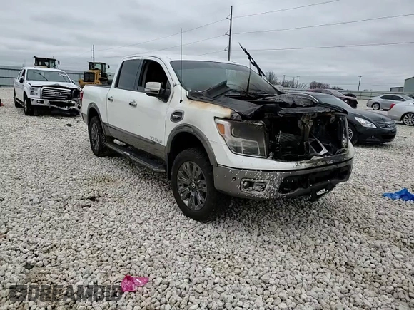 2017 Nissan Titan Platinum Reserve z VIN 1N6AA1E56HN542534, wystawiony jako Copart lot #44550645 z przebiegiem Nie podano mil oraz Szkoda całkowita • Salvage title. Historia ofert i sprzedaży dostępna na DreamBid. Obrazek 11.