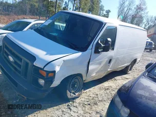 2014 Ford Econoline Cargo Commercial with VIN 1FTSE3ELXEDA59653, listed as a IAAI auction lot 41117376 with 288,008 mi miles. Bid and sale history available at carsss.com. Image 17.