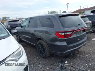 2016 Dodge Durango R/T with VIN 1C4SDJCT5GC440801, listed as a IAAI auction lot 42167132 with 151,016 mi miles and . Bid and sale history available at DreamBid. Image 3.