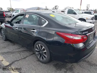 2018 Nissan Altima 2.5 SL with VIN 1N4AL3AP1JC198487, listed as a IAAI auction lot 41583866 with 146,172 mi miles. Bid and sale history available at carsss.com. Image 3.