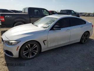 2015 BMW 4 Series 428i with VIN WBA4A5C5XFD410290, listed as a Copart auction lot 49067335 with 165,283 mi miles and Clean Title. Bid and sale history available at carsss.com. Image 1.