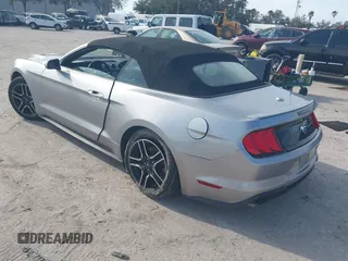 2020 Ford Mustang EcoBoost with VIN 1FATP8UH3L5120704, listed as a IAAI auction lot 41450853 with 88,351 mi miles and . Bid and sale history available at DreamBid. Image 3.