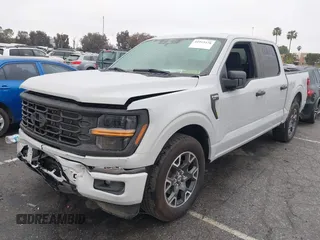 2024 Ford F-150 STX with VIN 1FTEW2KP7RFA29709, listed as a IAAI auction lot 41915128 with 5,883 mi miles and . Bid and sale history available at carsss.com. Image 2.