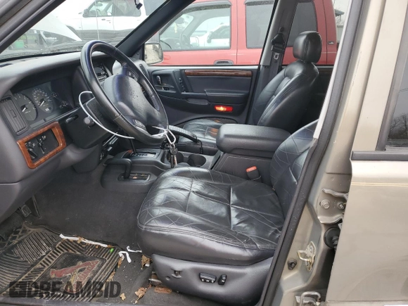 1997 Jeep Grand Cherokee Limited with VIN 1J4GZ78Y3VC568413, listed as a Copart auction lot 86171124 with 104,558 mi miles and Salvage Title. Bid and sale history available at carsss.com. Image 7.