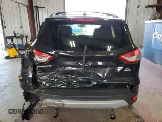 2013 Ford Escape SE with VIN 1FMCU9GXXDUC10995, listed as a Copart auction lot 62347185 with 131,631 mi miles and Salvage title. Bid and sale history available at DreamBid. Image 6.