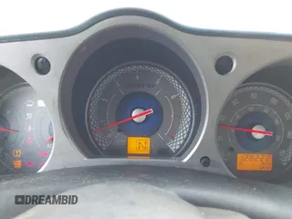 2008 Nissan 350Z Enthusiast z VIN JN1BZ34D68M706328, wystawiony jako IAAI lot #41567634 z przebiegiem 128 222 mil mil oraz . Historia ofert i sprzedaży dostępna na DreamBid. Obrazek 7.