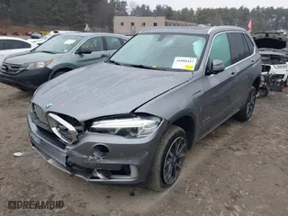 2018 BMW X5 xDrive40e iPerformance with VIN 5UXKT0C5XJ0W01374, listed as a IAAI auction lot 41088447 with 1 mi miles. Bid and sale history available at carsss.com. Image 17.