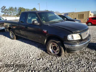 1999 Ford F-150 XL with VIN 1FTRX17L9XNA53124, listed as a Copart auction lot 49214405 with Not Provided miles and Salvage Title. Bid and sale history available at carsss.com. Image 4.