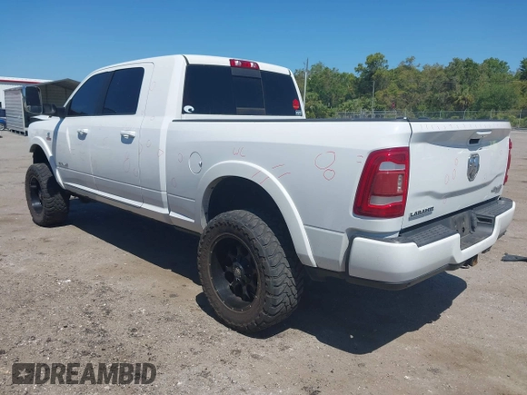 2019 Ram 2500 Laramie z VIN 3C6UR5NL2KG718789, wystawiony jako IAAI lot #42046325 z przebiegiem 54 965 mil mil oraz . Historia ofert i sprzedaży dostępna na DreamBid. Obrazek 3.