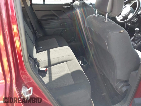 2014 Jeep Patriot Sport with VIN 1C4NJPBA6ED786064, listed as a IAAI auction lot 42783410 with 129,904 mi miles and . Bid and sale history available at DreamBid. Image 8.