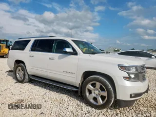 2017 Chevrolet Suburban Premier with VIN 1GNSCJKC1HR374998, listed as a Copart auction lot 60498905 with 240,652 mi miles and Salvage title. Bid and sale history available at DreamBid. Image 4.
