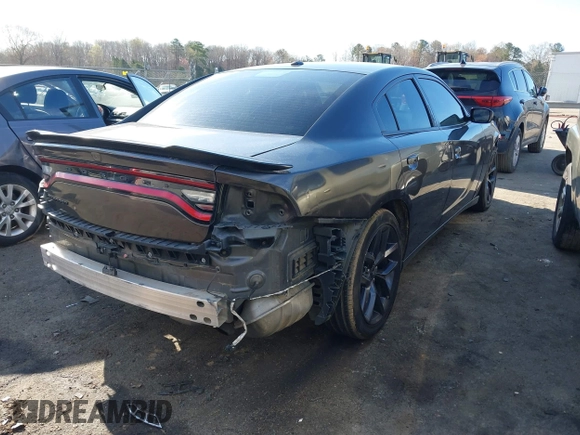 2020 Dodge Charger SXT with VIN 2C3CDXBG7LH101173, listed as a IAAI auction lot 41844489 with 157,773 mi miles. Bid and sale history available at carsss.com. Image 4.