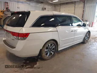 2015 Honda Odyssey Touring Elite with VIN 5FNRL5H97FB060060, listed as a IAAI auction lot 41829864 with Not Provided miles and . Bid and sale history available at DreamBid. Image 4.