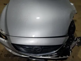 2017 Mazda 6 Sport z VIN JM1GL1U56H1104614, wystawiony jako Copart lot #52393145 z przebiegiem Nie podano mil oraz Szkody całkowita. Historia ofert i sprzedaży dostępna na DreamBid. Obrazek 11.
