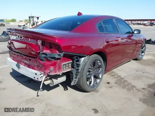 2018 Dodge Charger Daytona with VIN 2C3CDXCT3JH113264, listed as a IAAI auction lot 42053024 with 137,670 mi miles. Bid and sale history available at carsss.com. Image 4.