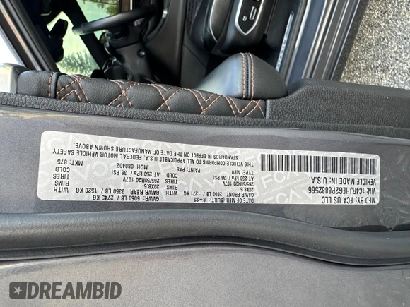 2023 Jeep Grand Cherokee Summit with VIN 1C4RJHEG2P8882566, listed as a Copart auction lot 65095905 with 59,970 mi miles and Salvage title. Bid and sale history available at DreamBid. Image 10.