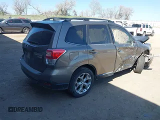 2017 Subaru Forester Touring z VIN JF2SJAWC8HH582683, wystawiony jako IAAI lot #42046369 z przebiegiem 71 070 mil mil oraz . Historia ofert i sprzedaży dostępna na DreamBid. Obrazek 4.