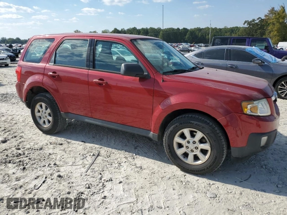 2011 Mazda Tribute Touring with VIN 4F2CY0C7XBKM00671, listed as a Copart auction lot 75431144 with 140,748 mi miles and Clean Title. Bid and sale history available at carsss.com. Image 4.