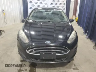 2019 Ford Fiesta SE z VIN 3FADP4BJ9KM151046, wystawiony jako Copart lot #56862255 z przebiegiem 77 002 mil mil oraz Tytuł czysty. Historia ofert i sprzedaży dostępna na DreamBid. Obrazek 5.