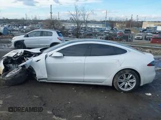 2021 Tesla Model S Long Range Plus with VIN 5YJSA1E20MF426400, listed as a IAAI auction lot 41453704 with Not provided miles and . Bid and sale history available at DreamBid. Image 13.