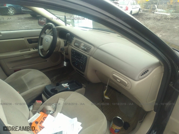 2006 Ford Taurus SE with VIN 1FAFP53U46A224012, listed as a IAAI auction lot 26269236 with 141,185 mi miles. Bid and sale history available at carsss.com. Image 5.
