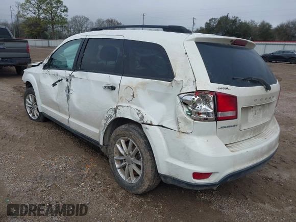 2015 Dodge Journey SXT with VIN 3C4PDCBG5FT744056, listed as a IAAI auction lot 41650391 with 148,192 mi miles and . Bid and sale history available at DreamBid. Image 3.