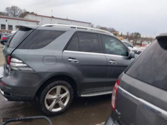 2017 Mercedes-Benz GLE with VIN 4JGDA5HB9HA992609, listed as a IAAI auction lot 41724638 with 205,921 mi miles. Bid and sale history available at carsss.com. Image 13.
