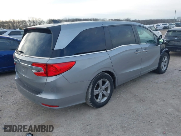 2018 Honda Odyssey EX-L z VIN 5FNRL6H72JB045639, wystawiony jako IAAI lot #41821993 z przebiegiem 60 737 mil mil oraz . Historia ofert i sprzedaży dostępna na DreamBid. Obrazek 4.