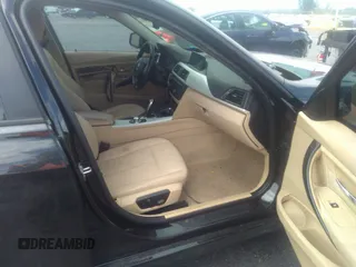 2013 BMW 3 Series 328i with VIN WBA3A5G55DNP26709, listed as a IAAI auction lot 37057796 with 103,168 mi miles and . Bid and sale history available at DreamBid. Image 5.
